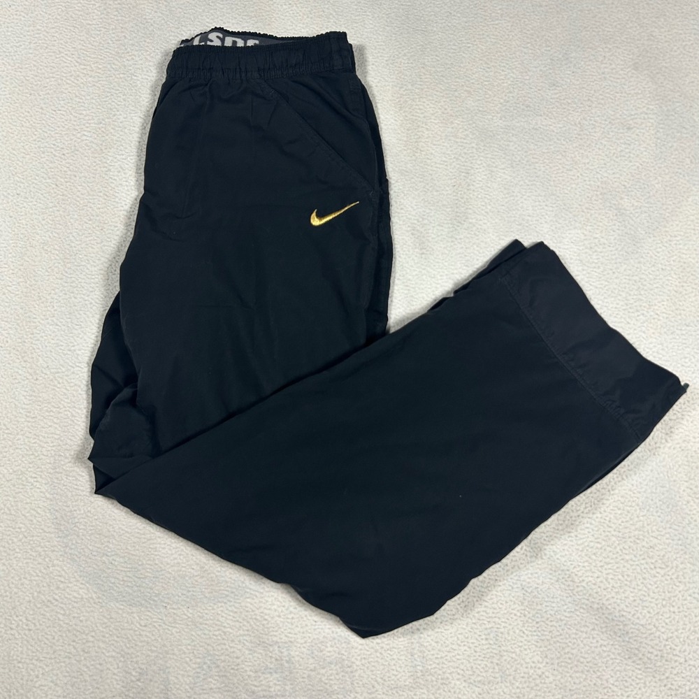 Nike Black Track Pants with Gold Swoosh